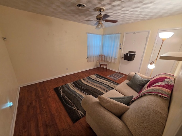 212 W 7th St, Lancaster, TX 75146 - living room featuring ceiling fan, wood finished floors, and baseboards
