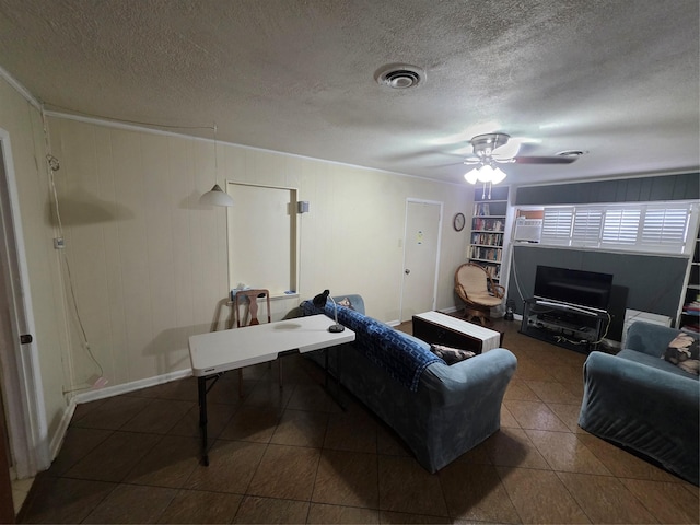212 W 7th St, Lancaster, TX 75146 - tiled living room with a textured ceiling and ceiling fan