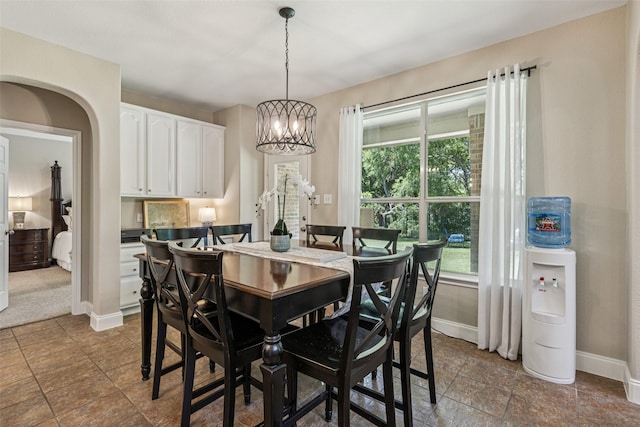 11310 Seguin Dr, Frisco, TX 75035 - dining space with baseboards and a chandelier