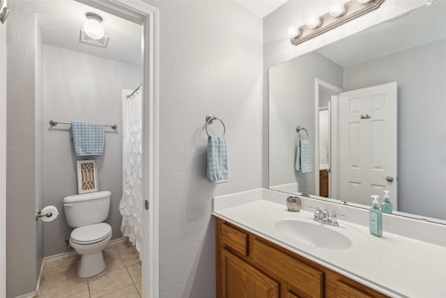 11310 Seguin Dr, Frisco, TX 75035 - bathroom featuring toilet, tile patterned floors, vanity, baseboards, and a shower with curtain