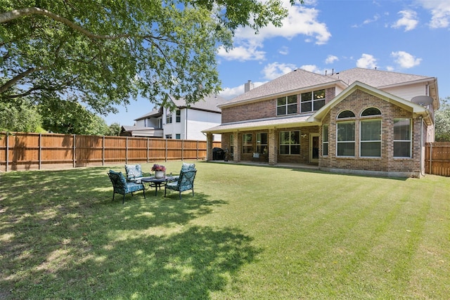 11310 Seguin Dr, Frisco, TX 75035 - back of house featuring brick siding, a chimney, and a shingled roof