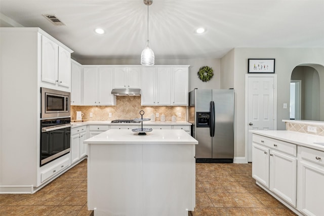 11310 Seguin Dr, Frisco, TX 75035 - kitchen with appliances with stainless steel finishes, under cabinet range hood, recessed lighting, and backsplash