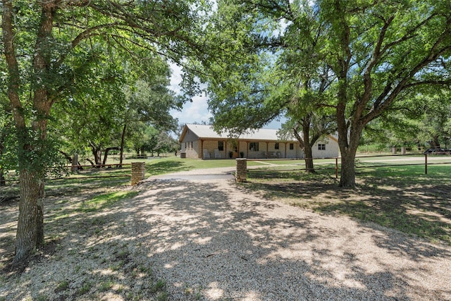 10048 E State Highway 36, Jonesboro, TX 76538 - single story home with a front lawn