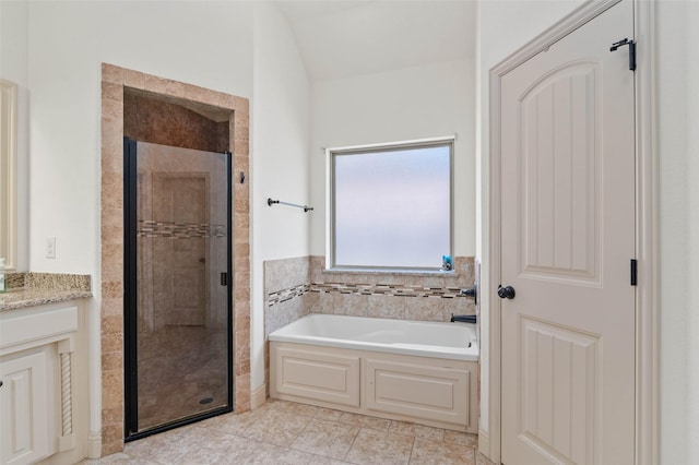705 La Paloma Rd, Sanger, TX 76266 - bathroom with a stall shower, a bath, vanity, and tile patterned floors