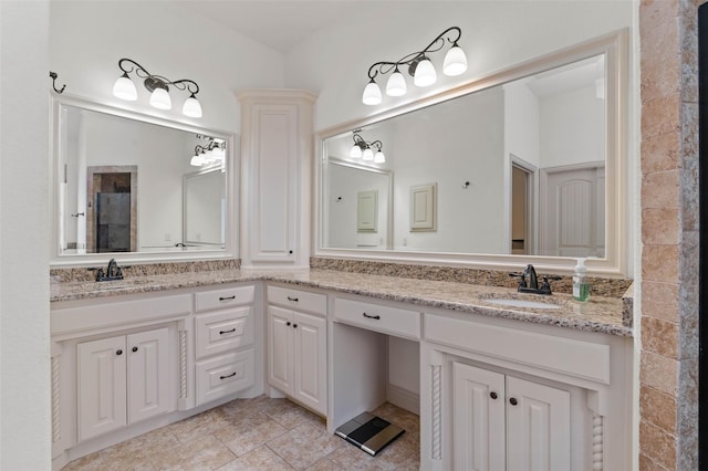 705 La Paloma Rd, Sanger, TX 76266 - full bath featuring double vanity and tile patterned floors