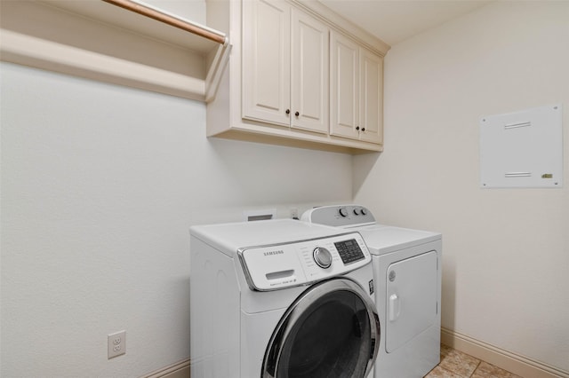 705 La Paloma Rd, Sanger, TX 76266 - laundry area featuring cabinet space, separate washer and dryer, baseboards, and light tile patterned floors