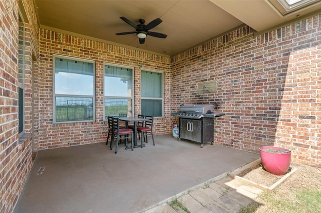 705 La Paloma Rd, Sanger, TX 76266 - view of patio featuring a ceiling fan, grilling area, and outdoor dining space
