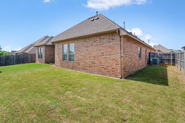 705 La Paloma Rd, Sanger, TX 76266 - rear view of property featuring brick siding, cooling unit, and roof with shingles