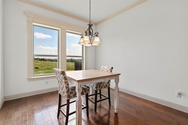 705 La Paloma Rd, Sanger, TX 76266 - dining room with a chandelier, crown molding, baseboards, and hardwood / wood-style flooring