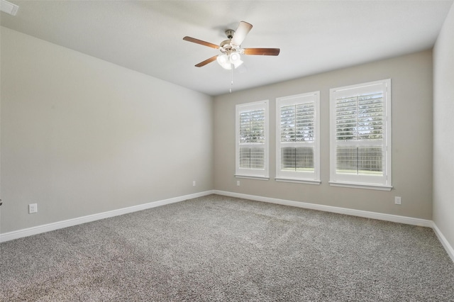 1253 Presidio Ln, Weatherford, TX 76087 - carpeted spare room featuring ceiling fan and baseboards