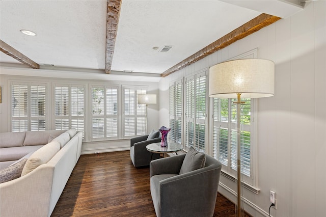 6015 Meadowcreek Dr, Dallas, TX 75248 - living room with beam ceiling, healthy amount of natural light, dark wood finished floors, and a textured ceiling