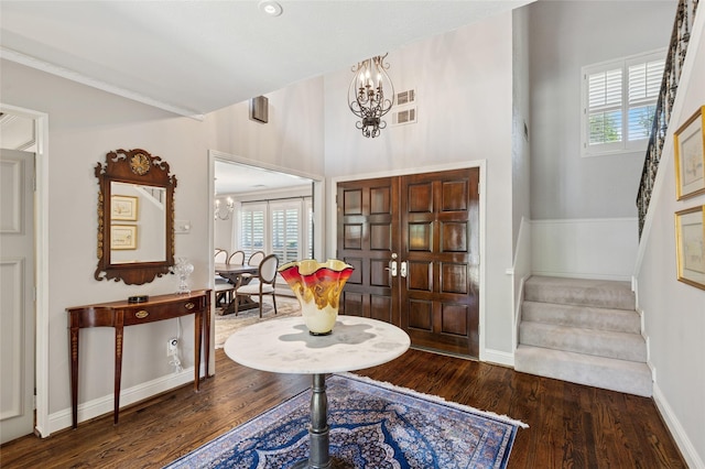 6015 Meadowcreek Dr, Dallas, TX 75248 - entrance foyer featuring stairway, wood finished floors, a chandelier, and plenty of natural light