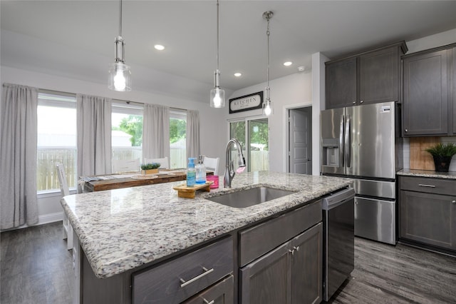 110 Thode St, Whitesboro, TX 76273 - kitchen featuring a sink, appliances with stainless steel finishes, dark wood-type flooring, an island with sink, and recessed lighting