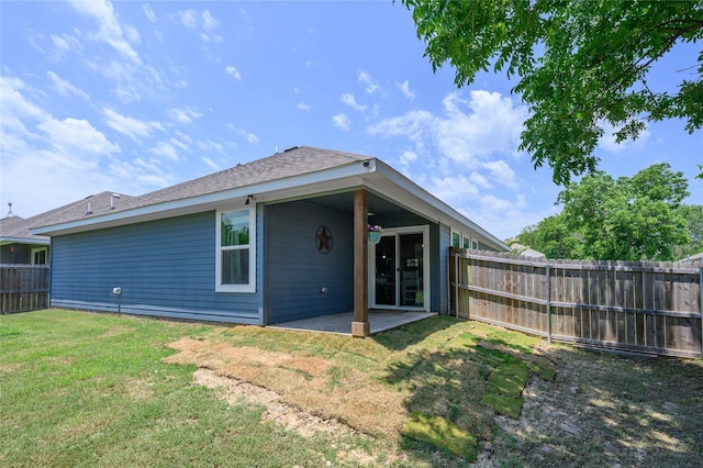 110 Thode St, Whitesboro, TX 76273 - rear view of house with a patio and roof with shingles
