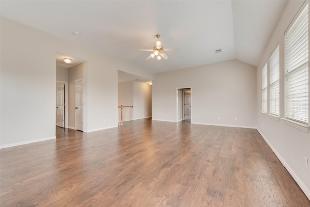 402 Thistle Ct, Southlake, TX 76092 - unfurnished room with ceiling fan, dark wood-style flooring, vaulted ceiling, and baseboards