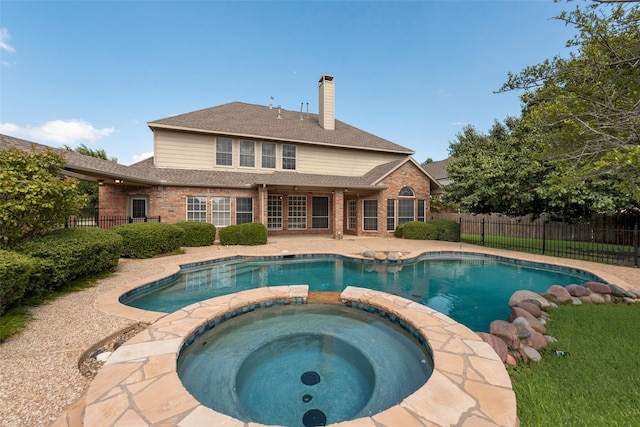 402 Thistle Ct, Southlake, TX 76092 - view of swimming pool with a pool with connected hot tub