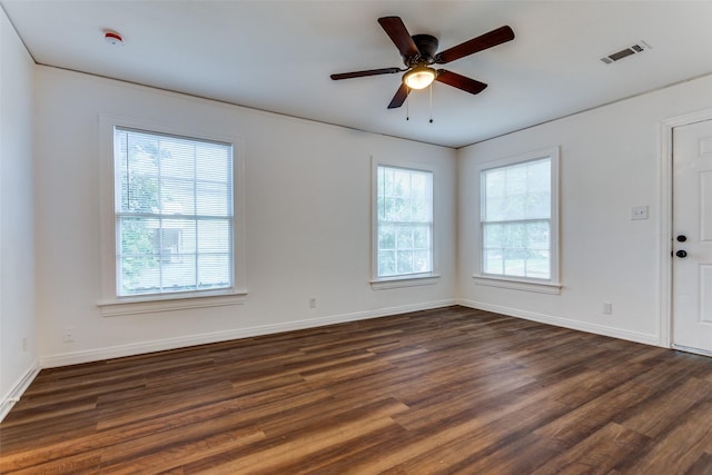 4104 Valentine St, Fort Worth, TX 76107 - unfurnished room featuring dark wood-style flooring, baseboards, and ceiling fan