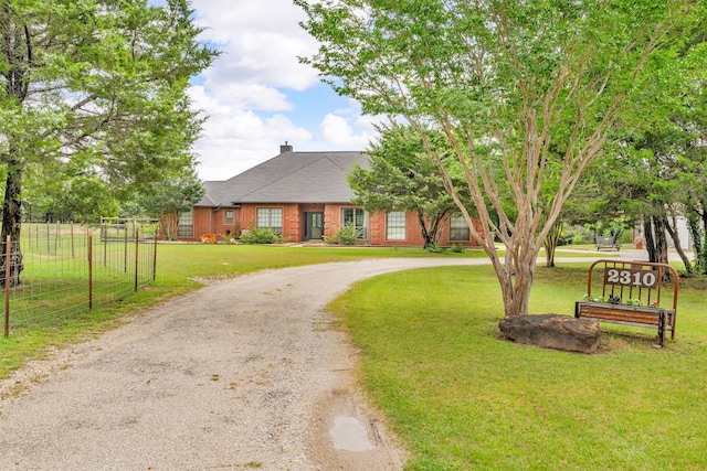 2310 N Walnut Grove Rd, Midlothian, TX 76065 - view of front facade featuring curved driveway and brick siding