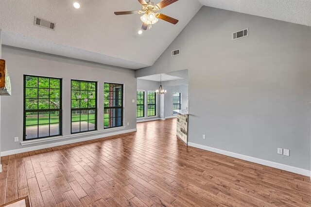 2310 N Walnut Grove Rd, Midlothian, TX 76065 - living room with ceiling fan, a textured ceiling, light carpet, and recessed lighting