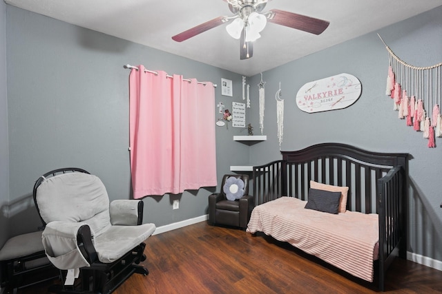 7504 Kingsmill Ter, Fort Worth, TX 76112 - bedroom featuring wood finished floors, baseboards, a nursery area, and a ceiling fan