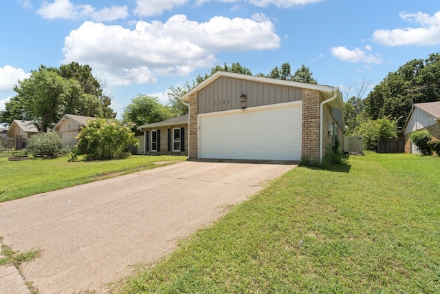 7504 Kingsmill Ter, Fort Worth, TX 76112 - view of front of property featuring an attached garage, driveway, a front lawn, and board and batten siding