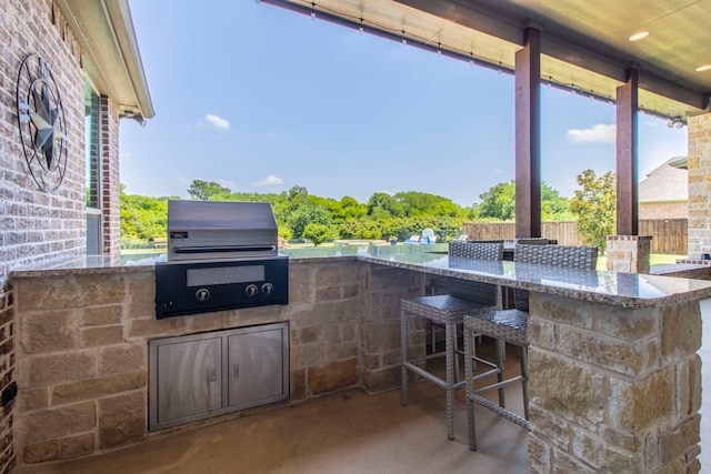 3340 Pleasantville Rd, Midlothian, TX 76065 - view of patio / terrace with exterior kitchen