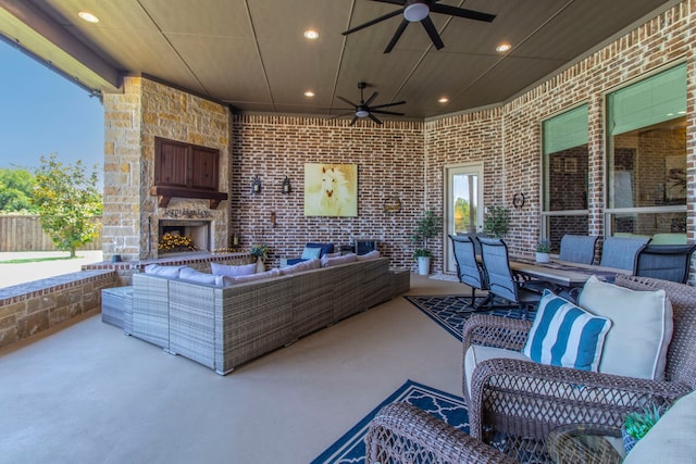 3340 Pleasantville Rd, Midlothian, TX 76065 - view of patio / terrace with an outdoor living space with a fireplace and ceiling fan