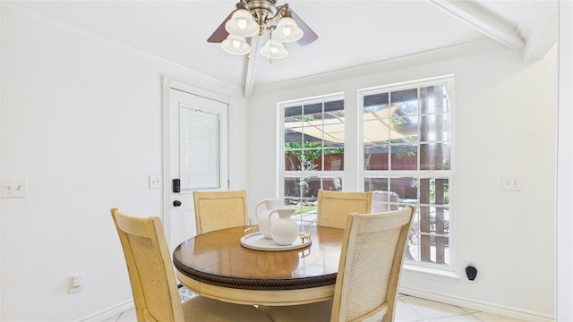 411 Roaring Springs Dr, Allen, TX 75002 - dining area with ceiling fan, crown molding, baseboards, and light tile patterned floors