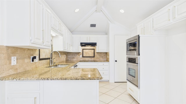 411 Roaring Springs Dr, Allen, TX 75002 - kitchen with a sink, appliances with stainless steel finishes, light stone countertops, and tasteful backsplash