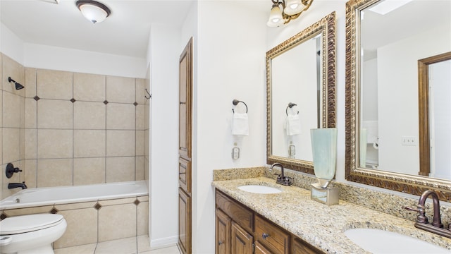 411 Roaring Springs Dr, Allen, TX 75002 - full bathroom with double vanity, tiled shower / bath combo, toilet, and tile patterned flooring