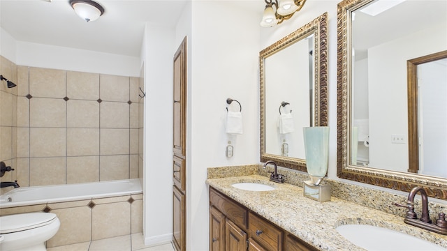 411 Roaring Springs Dr, Allen, TX 75002 - full bath with double vanity, toilet, tiled shower / bath, and tile patterned flooring