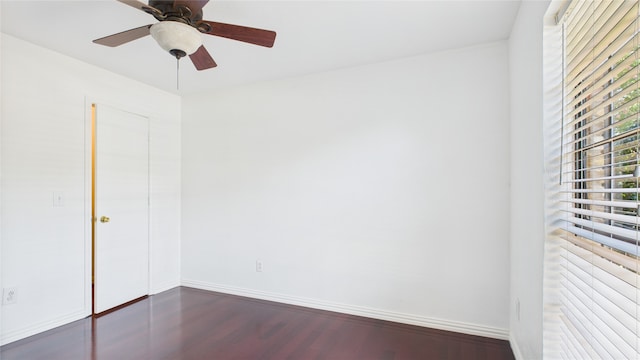 411 Roaring Springs Dr, Allen, TX 75002 - empty room with dark wood-style floors, baseboards, and ceiling fan