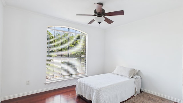 411 Roaring Springs Dr, Allen, TX 75002 - bedroom with baseboards, crown molding, wood finished floors, and ceiling fan