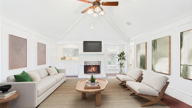 411 Roaring Springs Dr, Allen, TX 75002 - living room with a ceiling fan, vaulted ceiling, a fireplace, and a decorative wall