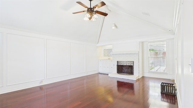 411 Roaring Springs Dr, Allen, TX 75002 - unfurnished living room featuring a decorative wall, ceiling fan, a brick fireplace, wood finished floors, and high vaulted ceiling