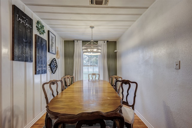 440 S Main St, Springtown, TX 76082 - dining space with wood finished floors and a chandelier