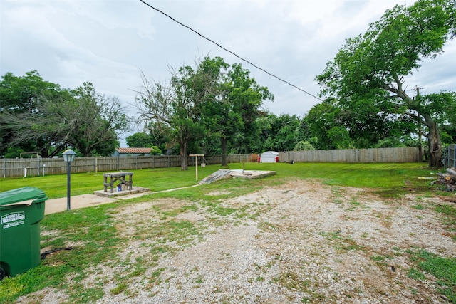 440 S Main St, Springtown, TX 76082 - fenced backyard featuring a storage shed