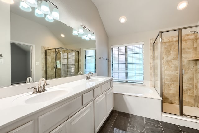 2128 Chambers Dr, Allen, TX 75013 - bathroom with lofted ceiling, a stall shower, double vanity, a garden tub, and recessed lighting