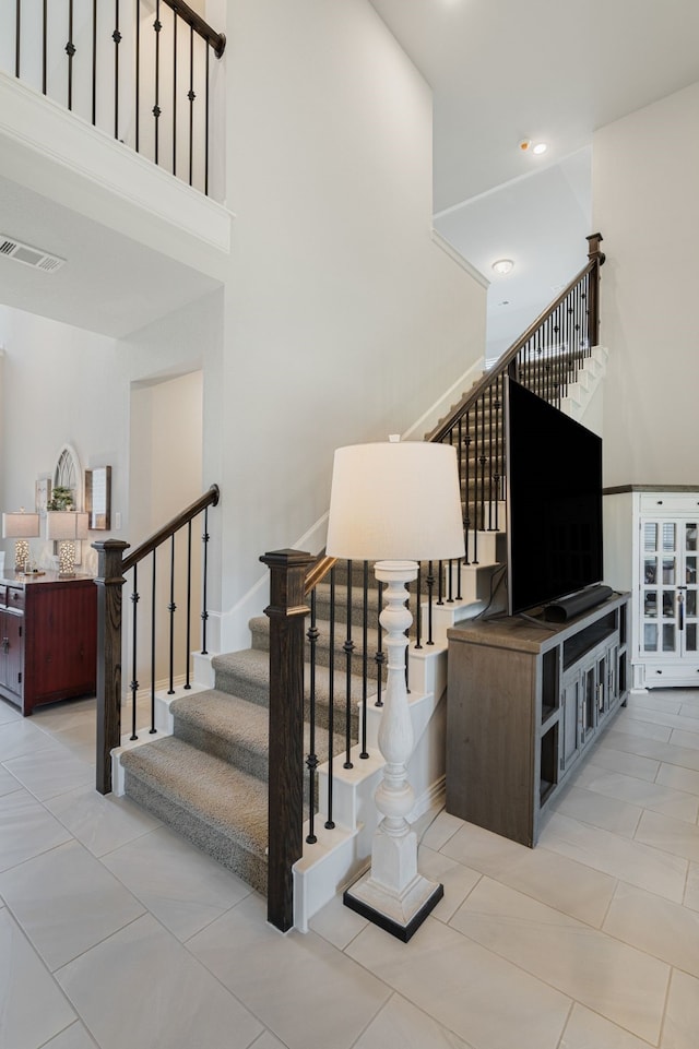 7020 Cross Point Ln, Little Elm, TX 76227 - staircase with a high ceiling