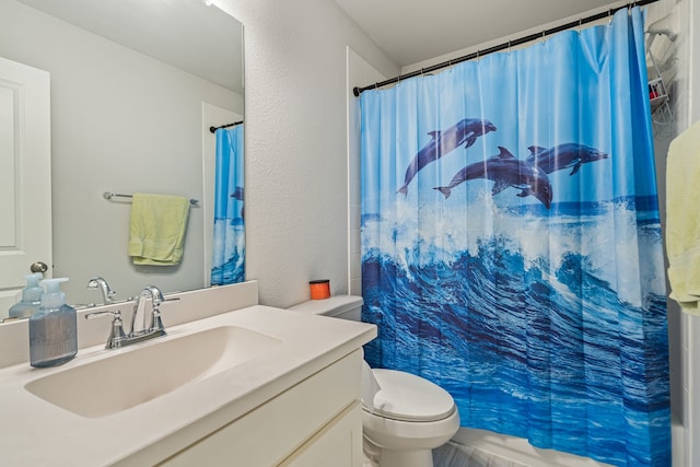 7020 Cross Point Ln, Little Elm, TX 76227 - full bathroom with vanity, toilet, a shower with curtain, and a textured wall