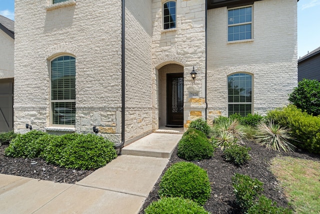 7020 Cross Point Ln, Little Elm, TX 76227 - doorway to property with stone siding