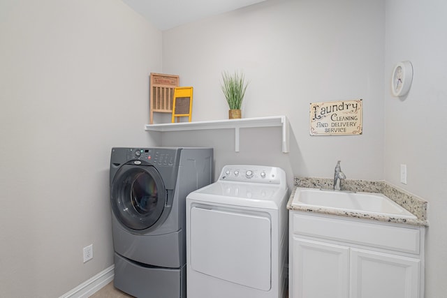 1205 Glacier Ct, Celina, TX 75009 - washroom with washing machine and clothes dryer, a sink, and baseboards