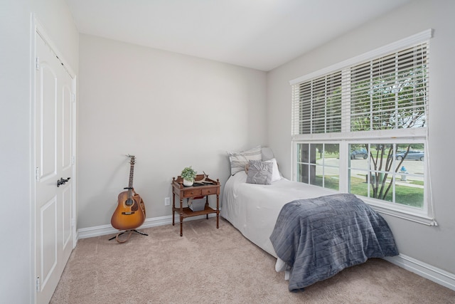 1205 Glacier Ct, Celina, TX 75009 - bedroom with light carpet and baseboards