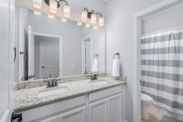 1205 Glacier Ct, Celina, TX 75009 - full bath with toilet, double vanity, tile patterned floors, and a shower with shower curtain