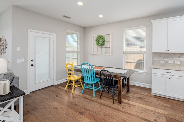 1205 Glacier Ct, Celina, TX 75009 - dining room with light wood finished floors, recessed lighting, and baseboards