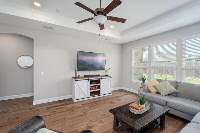1205 Glacier Ct, Celina, TX 75009 - living room with a raised ceiling, crown molding, baseboards, ceiling fan, and recessed lighting