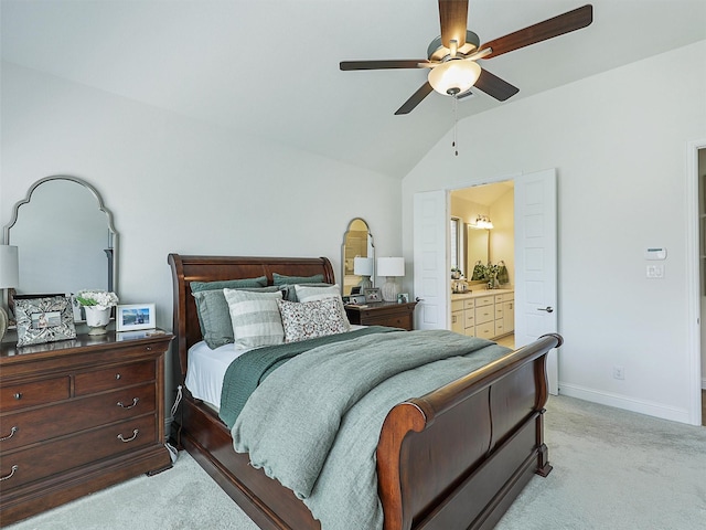 2624 Bellevue, The Colony, TX 75056 - bedroom with light colored carpet, vaulted ceiling, baseboards, ceiling fan, and connected bathroom