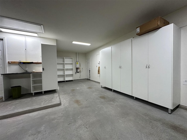 2624 Bellevue, The Colony, TX 75056 - garage featuring water heater