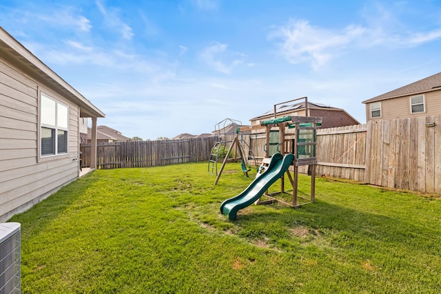 1615 White Mountain Way, Princeton, TX 75407 - view of yard featuring a playground and central air condition unit