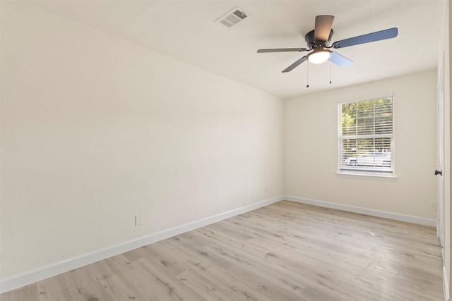 2810 Altman Dr, Irving, TX 75062 - spare room featuring light wood-style flooring, baseboards, and ceiling fan